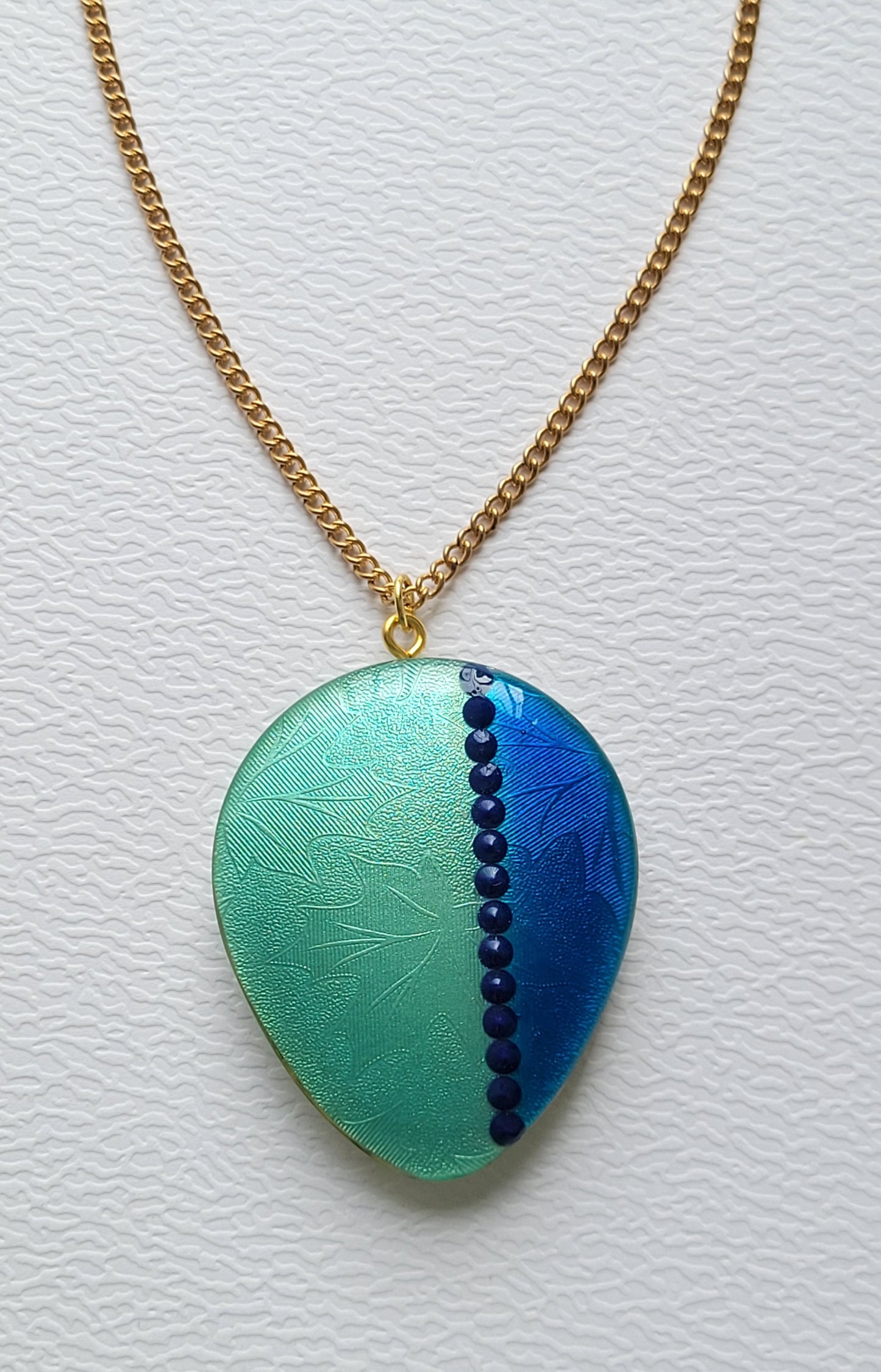 R115. Turquoise Teardrop Pendant