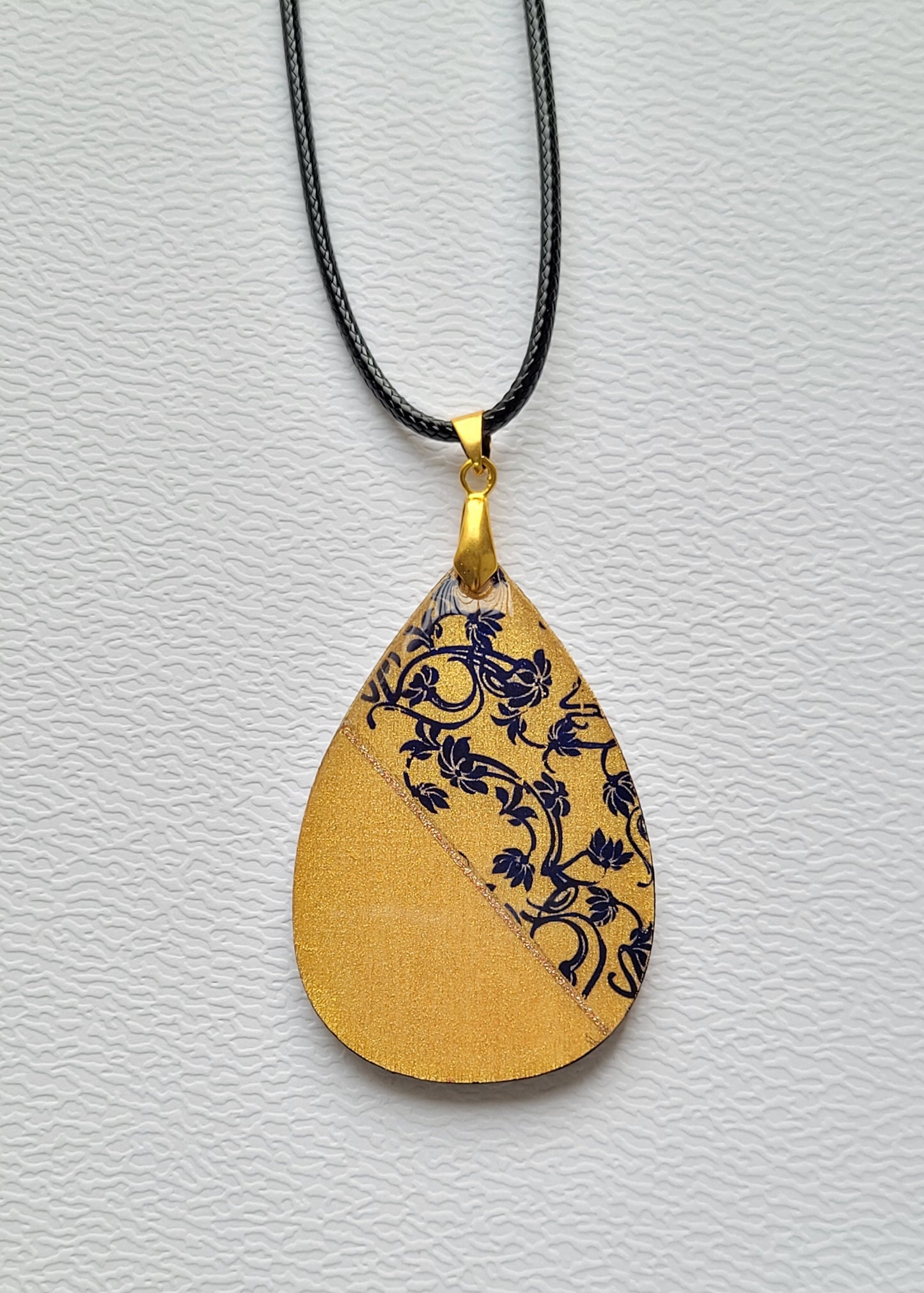 W107. Gold & Floral Teardrop Pendant